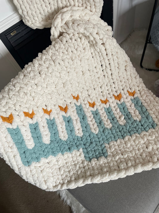Healing Hand, Chunky Knit Blankets | Chanukah Menorah Lapghan