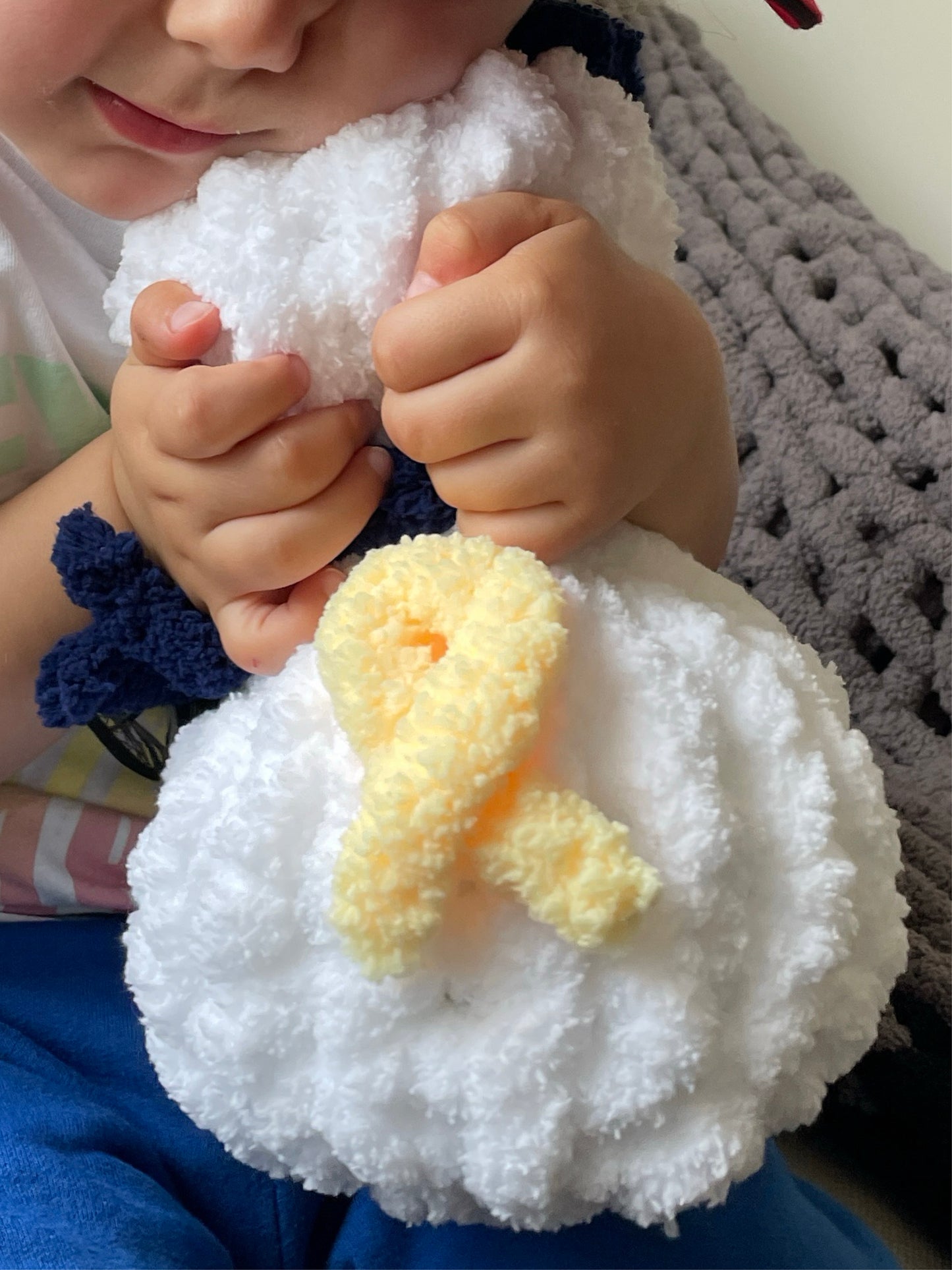 A Heartfelt Embrace: Chunky Knit Snowman with Kippah and Yellow Ribbon – A Symbol of Hope and Comfort