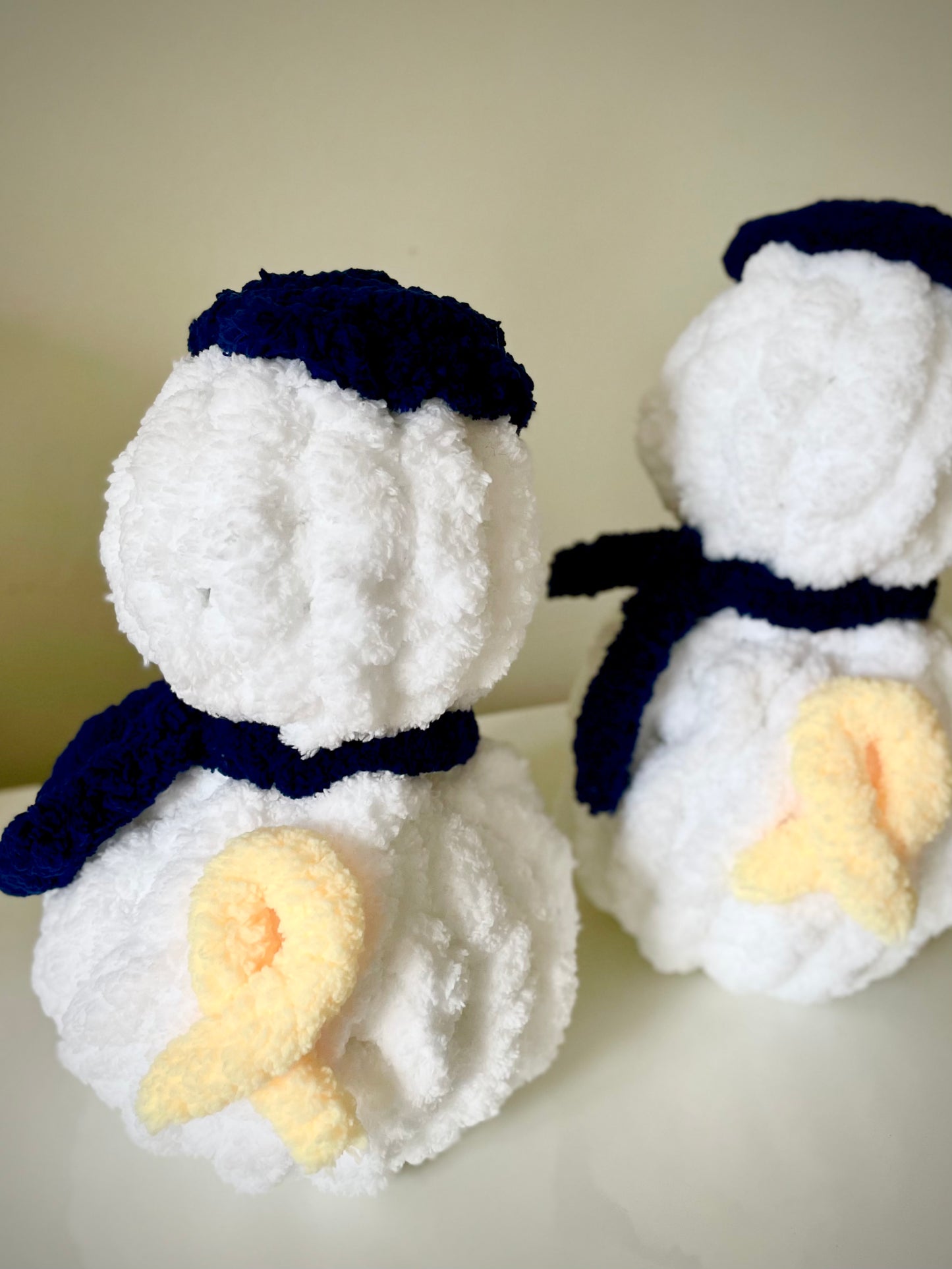 A Heartfelt Embrace: Chunky Knit Snowman with Kippah and Yellow Ribbon – A Symbol of Hope and Comfort