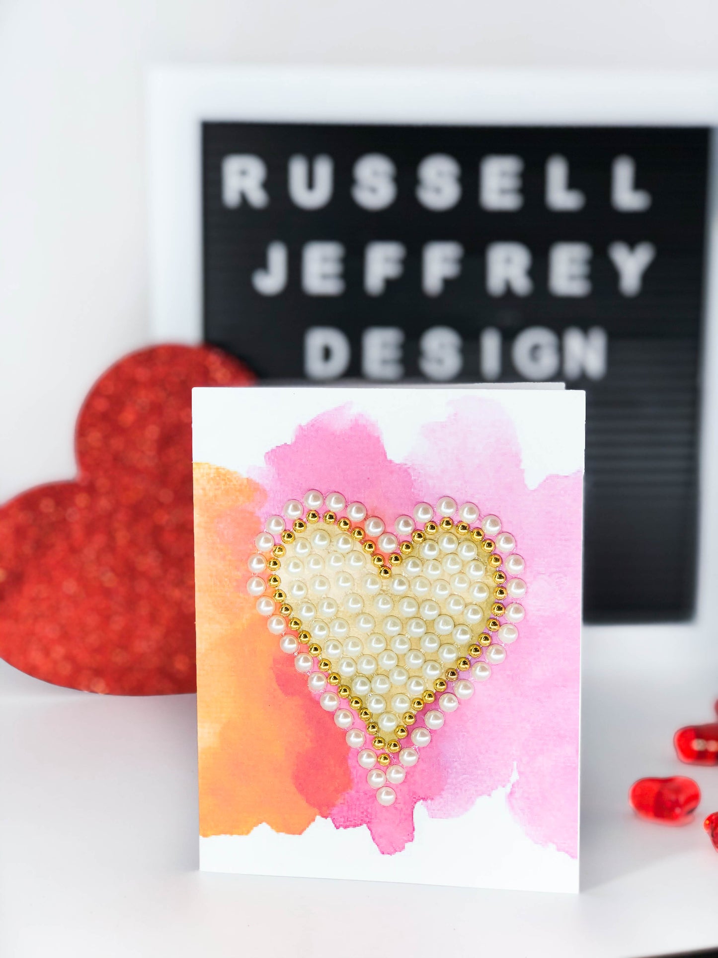 Valentine's Day Greeting Card Heart on Pink and Orange Watercolour Background