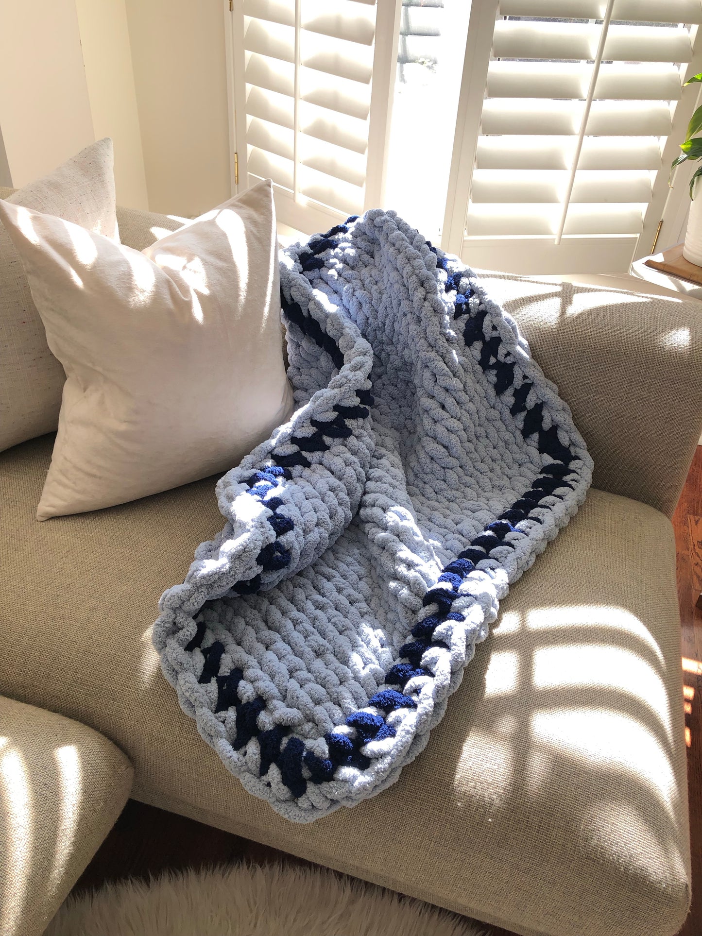 Healing Hand, Chunky Knit Baby Blankets - Light Blue Edged with Navy Blue Baseball Stitch